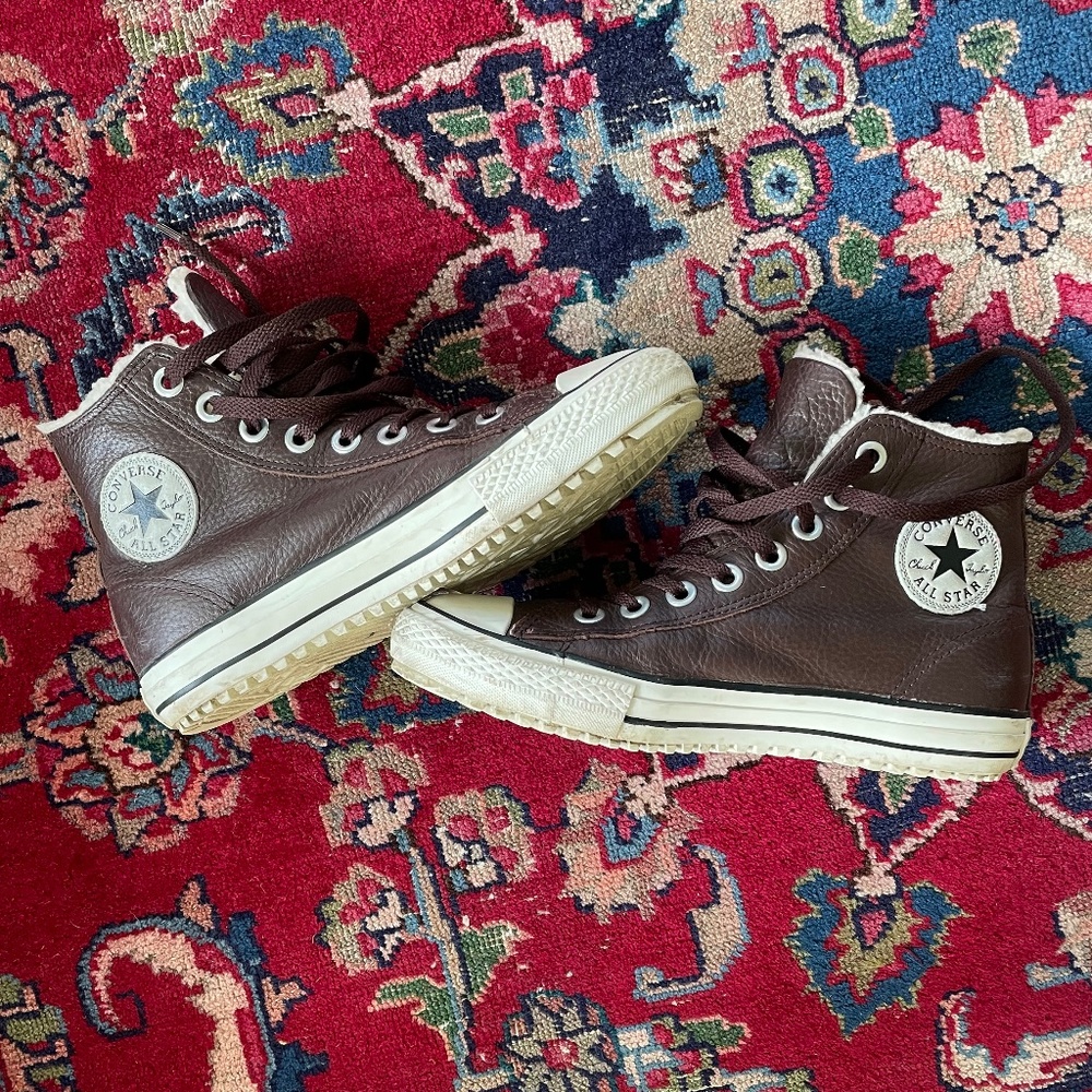 Brown leather Converse high tops